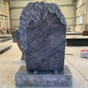 double sided carved with layered flowers headstone