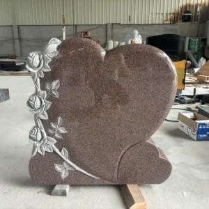 heart shaped headstone with carved roses