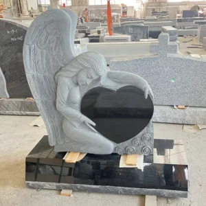 double sided carved angel holding heart memorial